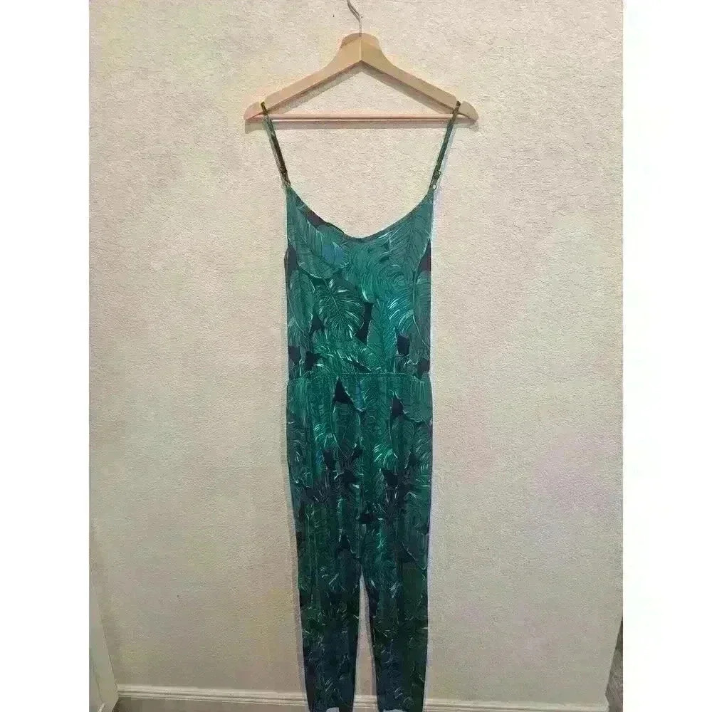Green floral pant Romper, visouce material. Sz Medium